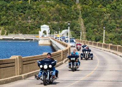 bikers on the Bagnell Dam